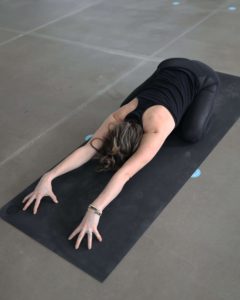 Bulldog yoga online classes instructor Tessa Jenkins (RYT 500) demonstrates childs yoga pose